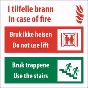 I tilfelle brann - Bruk ikke heisen - bruk trappene - Norsk og engelsk tekst